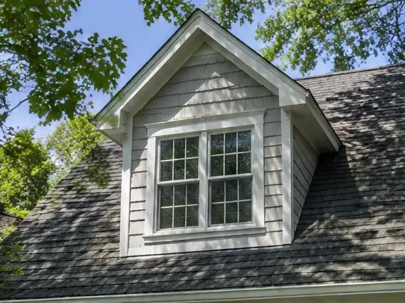 Clean dormer and shaded roof slope on a home in Barrington, IL